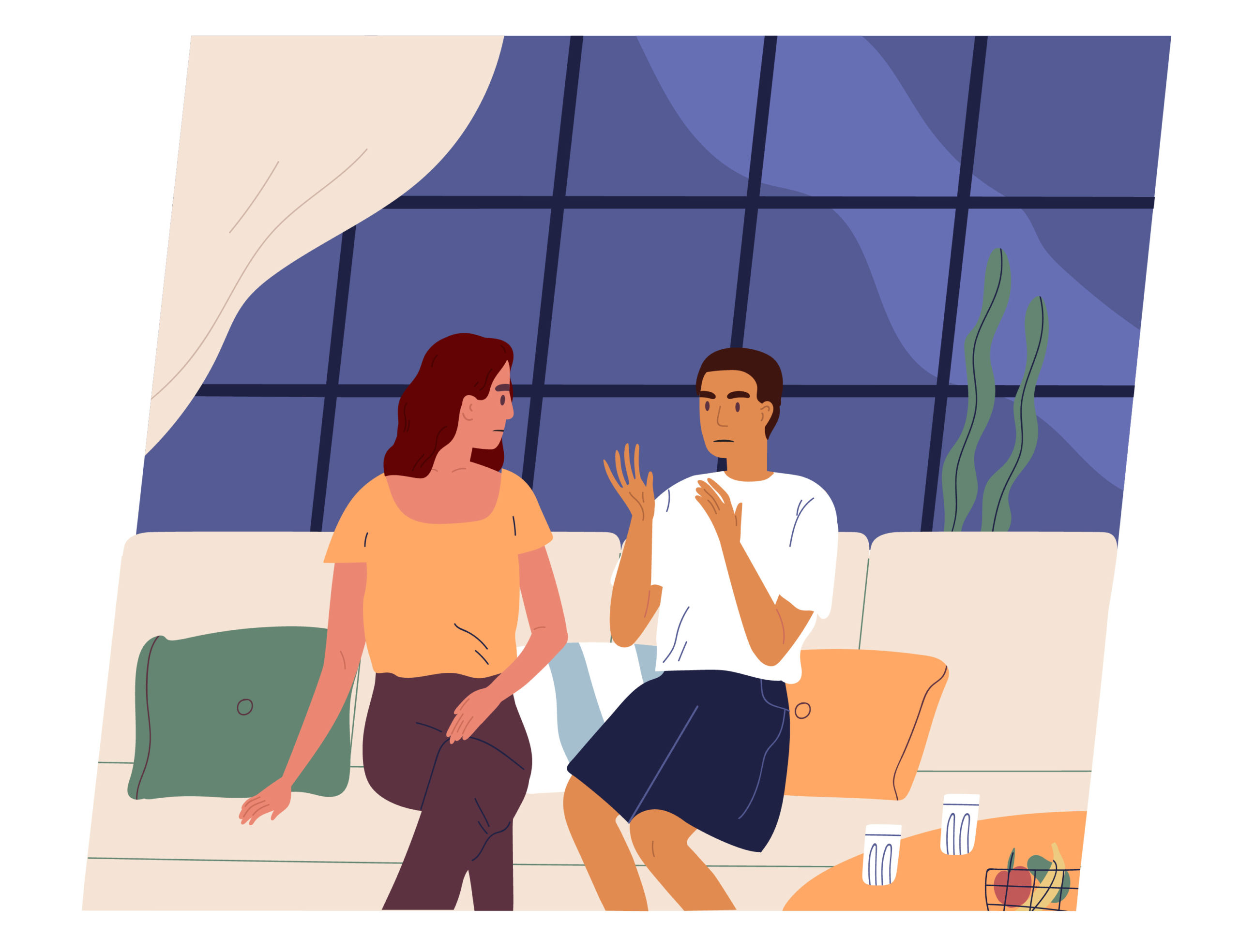 two people sitting on couch communicating